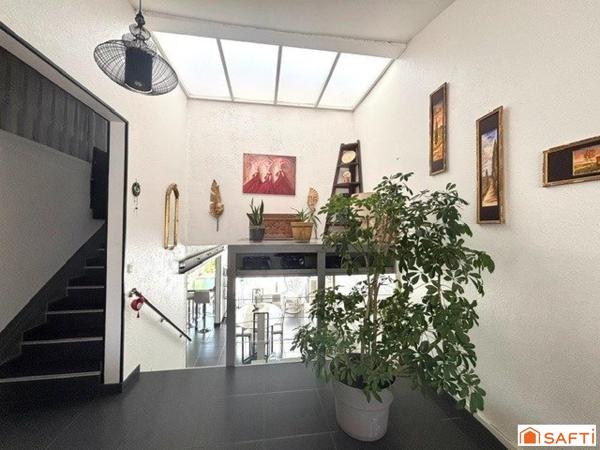 PAVILLON PROCHE DES COMMODITES DANS UN CADRE VERDOYANT
