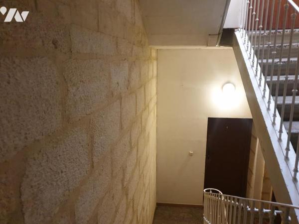 Immeuble de rapport composé de 5 logements avec 2 garages et une remise