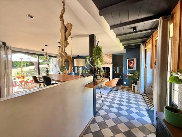 Charme et authenticité pour cette propriété en pierre avec une activité de Gîte