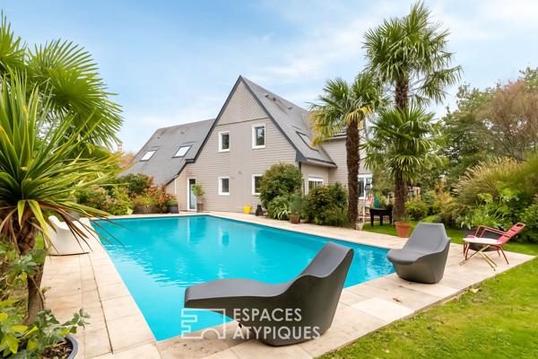 Maison d’architecte en ossature bois avec piscine et vue sur le golf