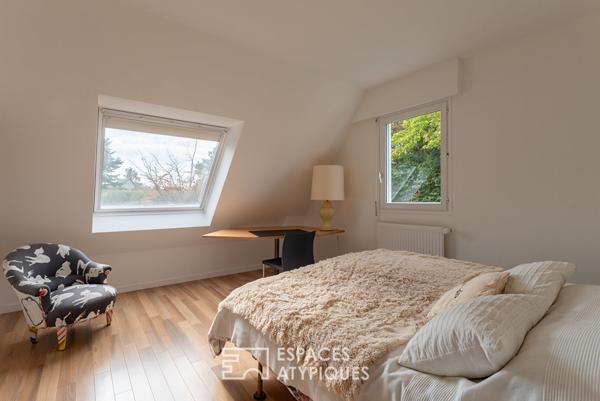 Maison d’architecte en ossature bois avec piscine et vue sur le golf