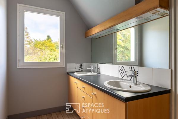 Maison d’architecte en ossature bois avec piscine et vue sur le golf