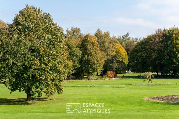 Maison d’architecte en ossature bois avec piscine et vue sur le golf