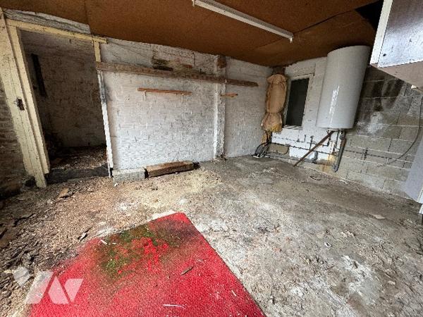 Maison d'habitation à NONANT LE PIN (env 85 m² habitable) à rénover située dans le bourg