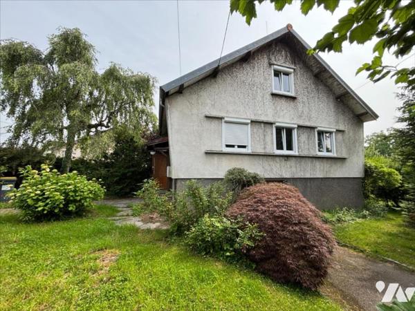 Maison 4 pièces (environ 84 m² habitables) située dans un secteur calme, proche centre