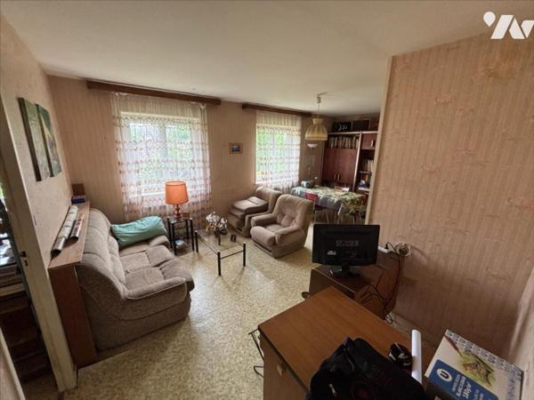 Maison 4 pièces (environ 84 m² habitables) située dans un secteur calme, proche centre