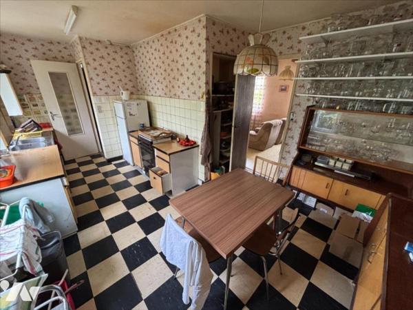 Maison 4 pièces (environ 84 m² habitables) située dans un secteur calme, proche centre