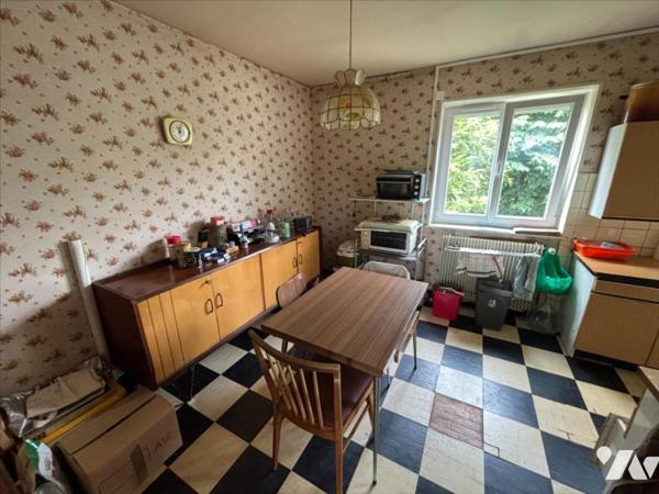 Maison 4 pièces (environ 84 m² habitables) située dans un secteur calme, proche centre