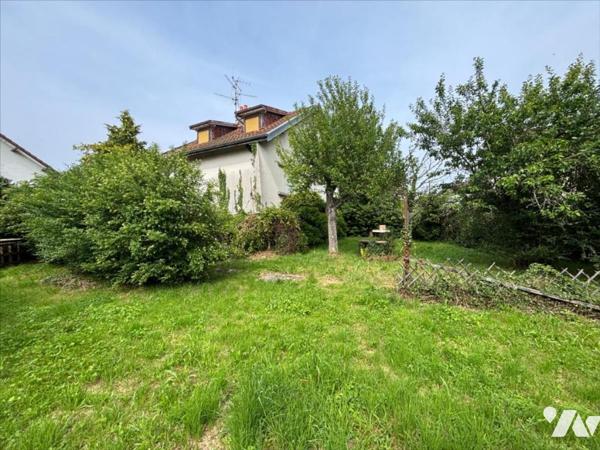 Maison 4 pièces (environ 84 m² habitables) située dans un secteur calme, proche centre