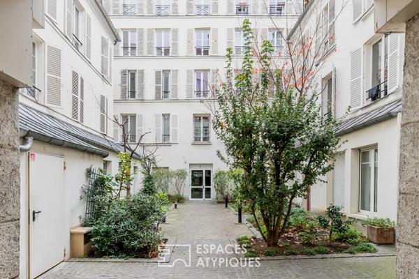 Duplex sous les toits en dernier étage