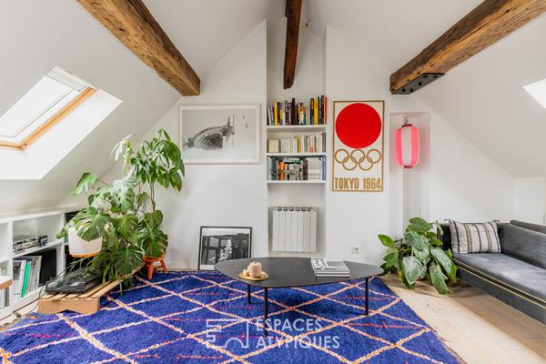 Duplex sous les toits en dernier étage