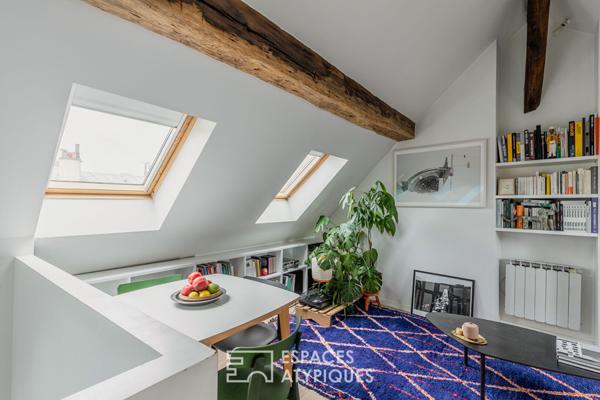 Duplex sous les toits en dernier étage