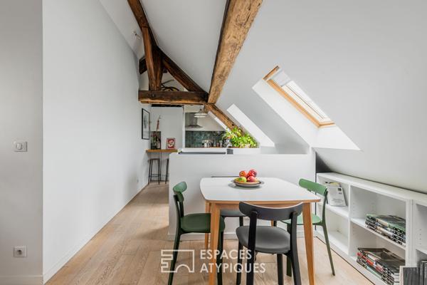 Duplex sous les toits en dernier étage