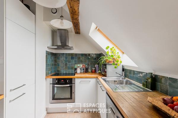 Duplex sous les toits en dernier étage