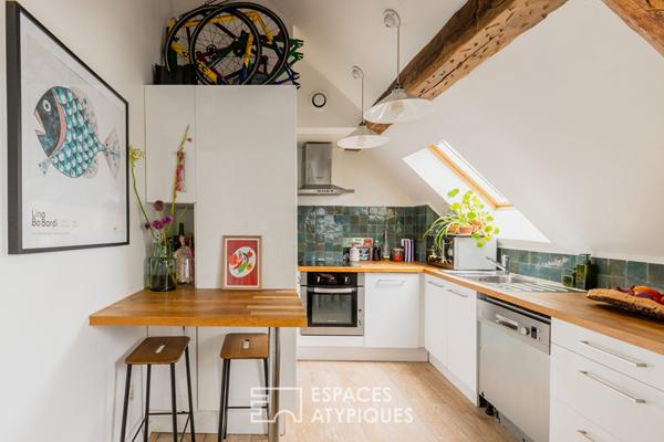 Duplex sous les toits en dernier étage