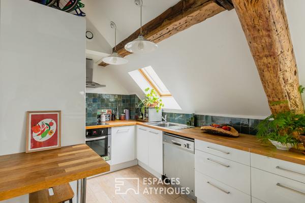 Duplex sous les toits en dernier étage