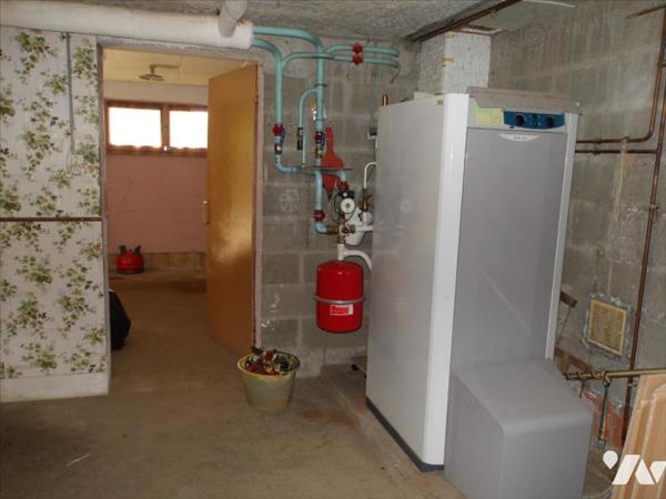 PAVILLON SUR SOUS-SOL SUR TERRAIN 665 M²