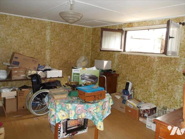 PAVILLON SUR SOUS-SOL SUR TERRAIN 665 M²