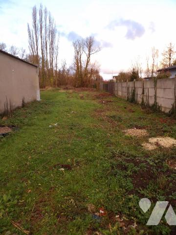 CHOCQUES, une parcelle de terrain à bâtir de 1100 m²