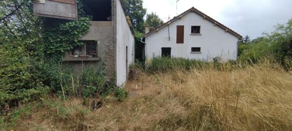 Maison avec terrain et point d'eau