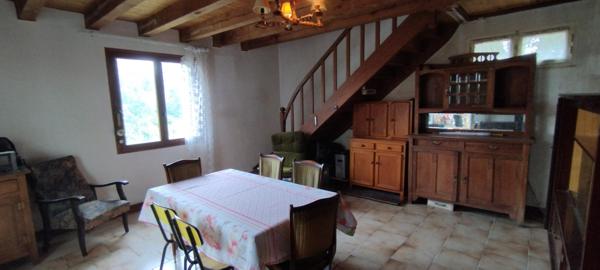 Maison avec terrain et point d'eau