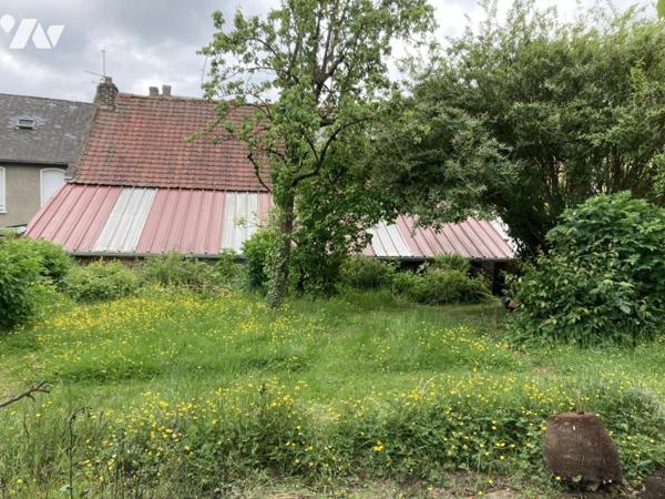 BUCQUOY - MAISON BOURGEOISE avec grange et jardin.