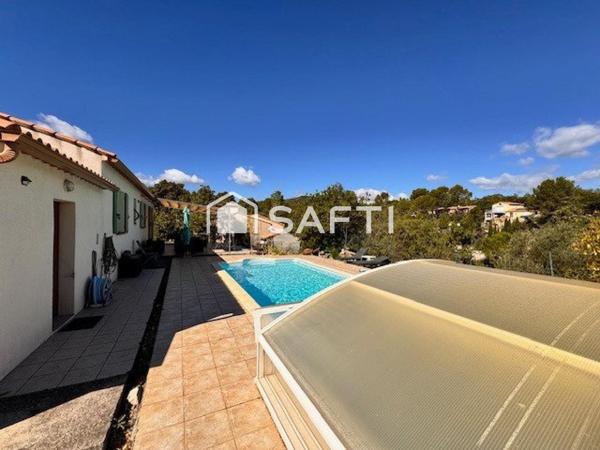 Villa plain-pied T4 avec piscine et garage.