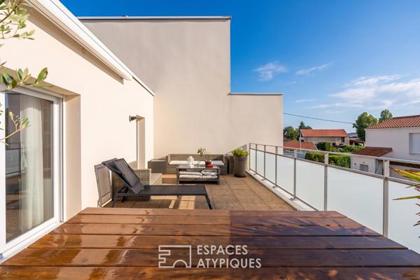 Appartement contemporain et sa terrasse suspendue aux Sorinières