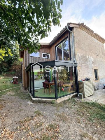 Maison en pierre au cœur de la nature