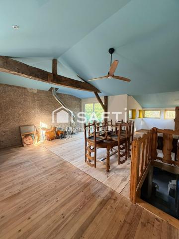 Maison en pierre au cœur de la nature