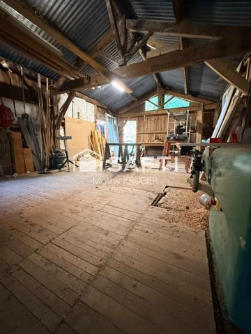 Maison en pierre au cœur de la nature