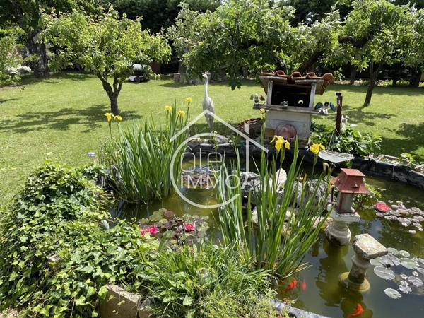 LAMONZIE SAINT MARTIN : Charmante maison de plain-pied 6 pièces de 144m² avec studio attenant