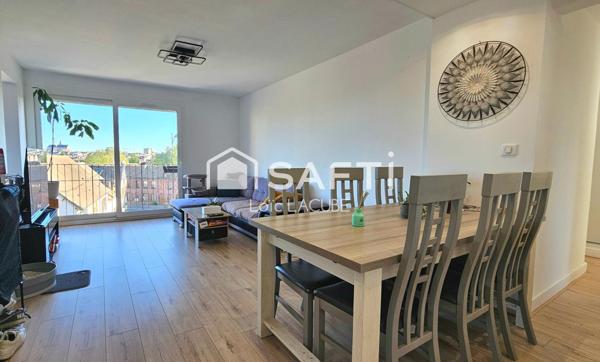 Appartement 75m2 avec grand jardin, garage et 2 parkings+ cave.