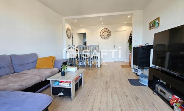 Appartement 75m2 avec grand jardin, garage et 2 parkings+ cave.