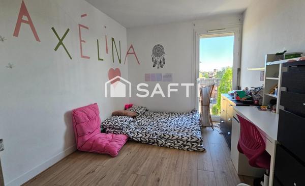 Appartement 75m2 avec grand jardin, garage et 2 parkings+ cave.
