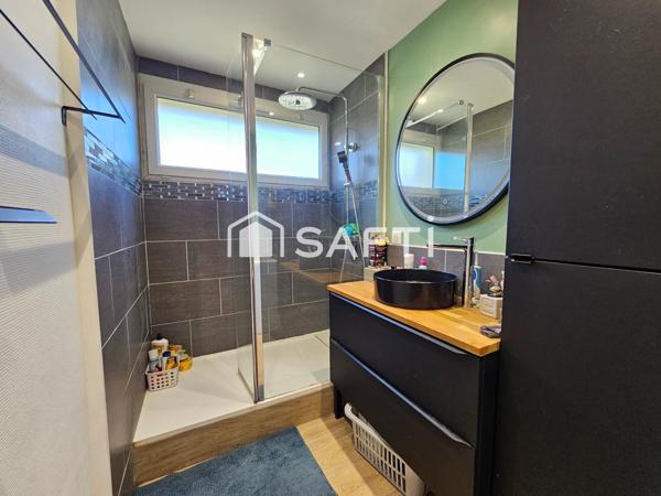 Appartement 75m2 avec grand jardin, garage et 2 parkings+ cave.