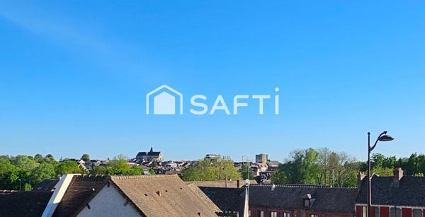 Appartement 75m2 avec grand jardin, garage et 2 parkings+ cave.