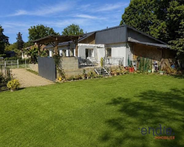 MAISON PLEIN PIED GARAGE TERRAIN ET ETANG