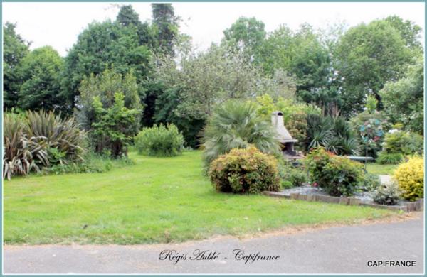 A vendre à la MEZIERE (35) Maison de plain-pied dans un parc Floral.