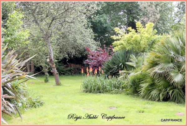 A vendre à la MEZIERE (35) Maison de plain-pied dans un parc Floral.