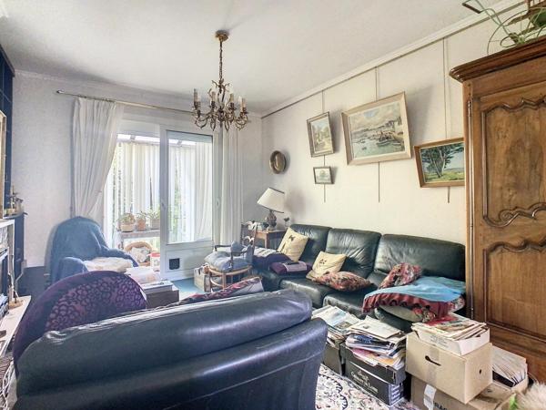 Maison familiale 4 chambres avec jardin, garage et fort potentiel