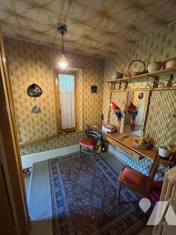 Maison 6 pièces (environ 128 m² habitables), située dans un secteur calme, proche commodités