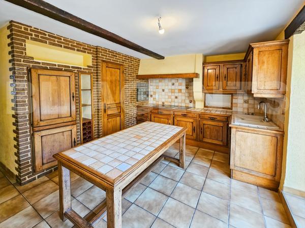 Maison familiale avec jardin à Prix-lès-Mézières