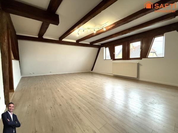 Superbe appartement de 4 pièces disposant d'une cave et d'une place de stationnement couverte !