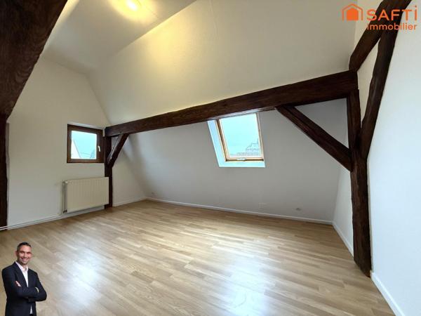 Superbe appartement de 4 pièces disposant d'une cave et d'une place de stationnement couverte !