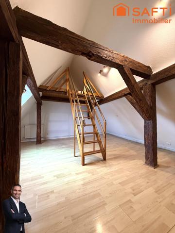 Superbe appartement de 4 pièces disposant d'une cave et d'une place de stationnement couverte !