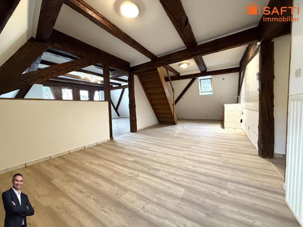 Superbe appartement de 4 pièces disposant d'une cave et d'une place de stationnement couverte !