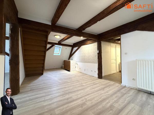 Superbe appartement de 4 pièces disposant d'une cave et d'une place de stationnement couverte !