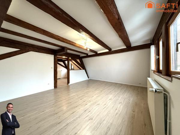 Superbe appartement de 4 pièces disposant d'une cave et d'une place de stationnement couverte !
