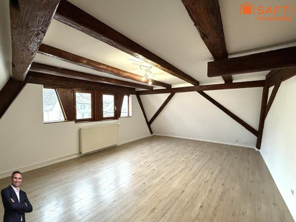 Superbe appartement de 4 pièces disposant d'une cave et d'une place de stationnement couverte !